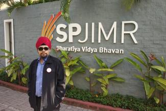 Gagandeep standing outside SPJIMR