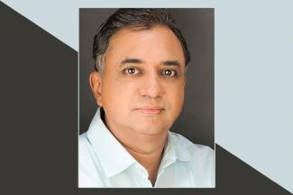 Profile pic of the author a middle aged indian man