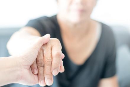 Image showing a hand holding a person's hand and guiding the person