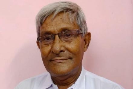 Image Description: Head shot of a 77 year old survivor of cancer of the vocal chord 